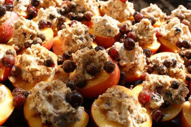 A prepared tray of nectarines, before baking. 